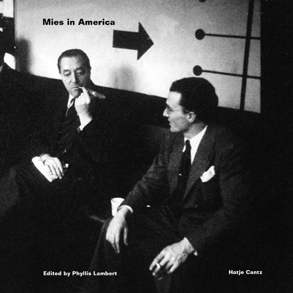 Das Schwarz-Weiß-Cover des Buches Mies in America zeigt zwei Männer in Anzügen, die sich unterhalten, während einer eine Zigarre raucht.