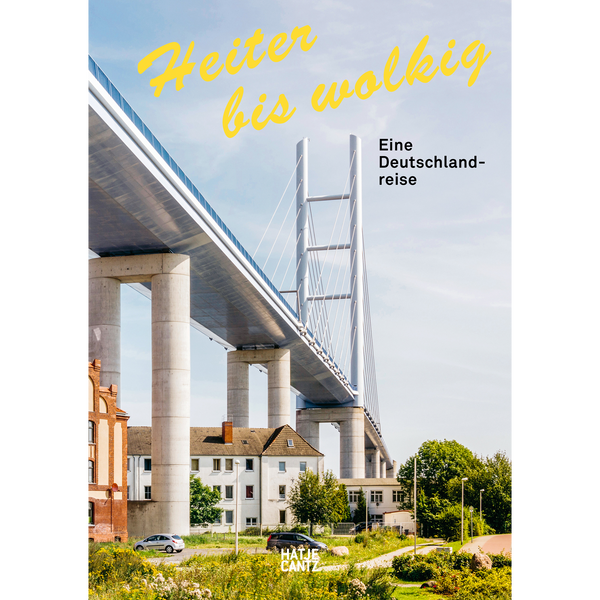Ein Buchcover mit dem Titel Heiter bis wolkig, Eine Deutschland-reise. Es zeigt eine große, moderne Brücke, die sich über ältere Häuser und eine grüne Landschaft spannt.